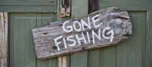 gone fishing sign discussing website maintenance blog cms news