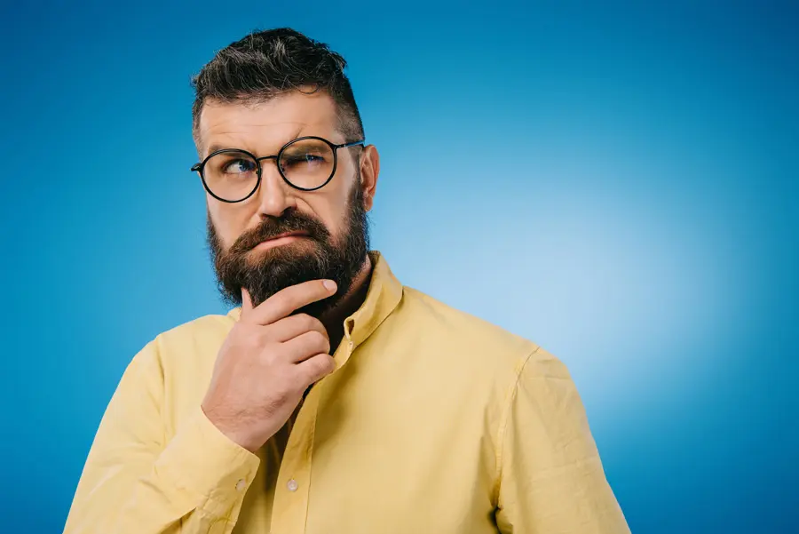 man thinking about the reasons he has a website