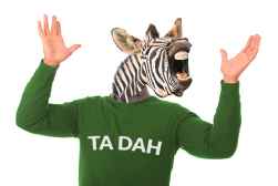 Man with a Zebra Head wearing a green TA DA shirt