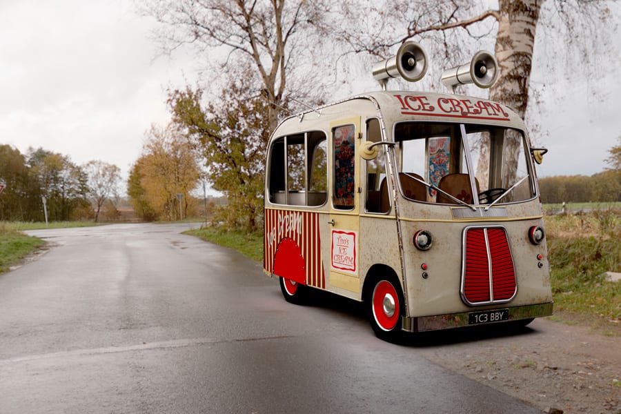 Ice cream van parked on countryside road