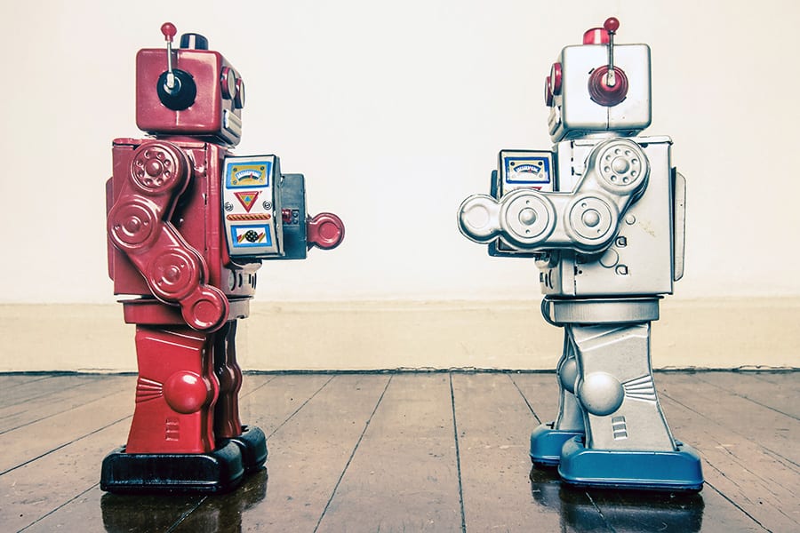 red and silver robots facing off