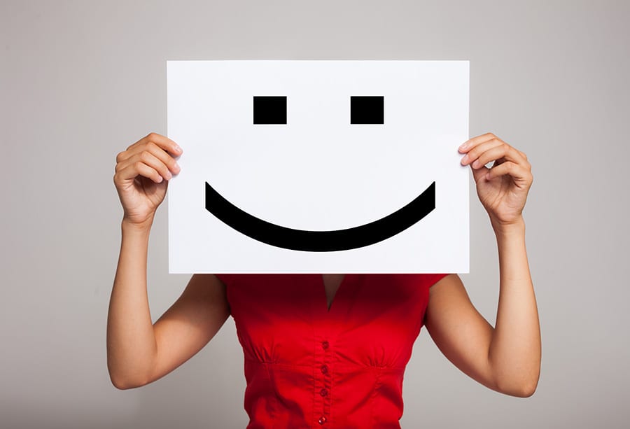 happy customer smiley face after good user experience online